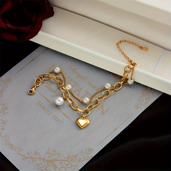 Sjika - Gold plated armband met parels & hartbedel – Luxe damesarmband – Trendy schakel design – Perfect cadeau voor haar