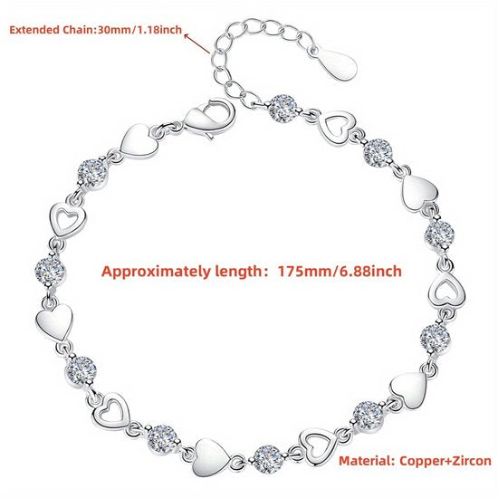Sjika - Hartjes Armband Dames Zilverkleurig – Elegante Armband met Kristal Hartjes – Verstelbare Luxe Dames Sieraden – Trendy Armband - Cadeau voor haar