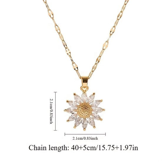 Sjika - Bloem Ketting Dames Goudkleurig – Elegante Zonnebloem Hanger met Kristal Steentjes – Luxe Dames Ketting – Trendy Sieraden - Cadeau voor haar