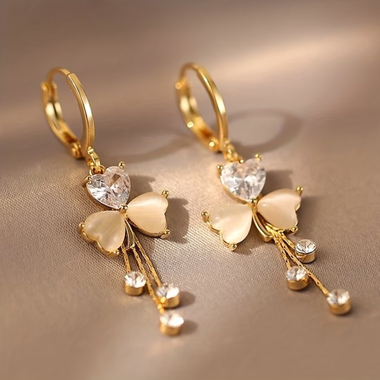 Sjika - Vlinder Oorbellen Dames Goudkleurig – Hartvormige Kristal Oorringen – Elegante Hangoorbellen met Strass – Trendy Sieraden voor Dames - Cadeau voor haar