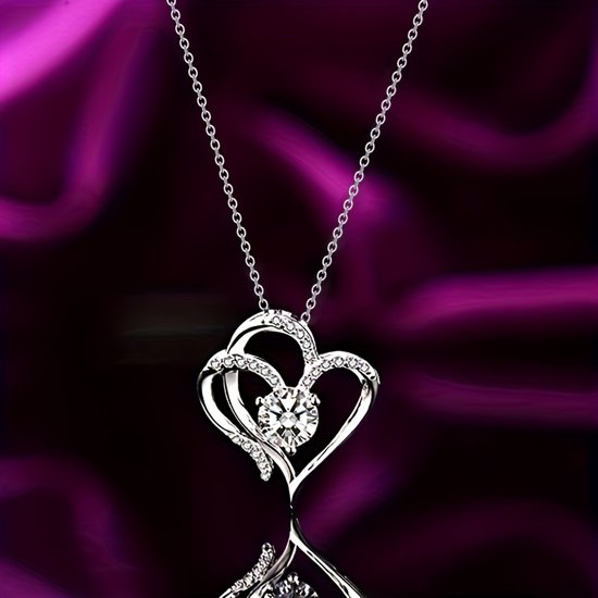 Sjika - Zilverkleurige Dubbel Hart Ketting met Kristal – Luxe Hartjes Hanger – Romantische Dames Ketting – Perfect Cadeau