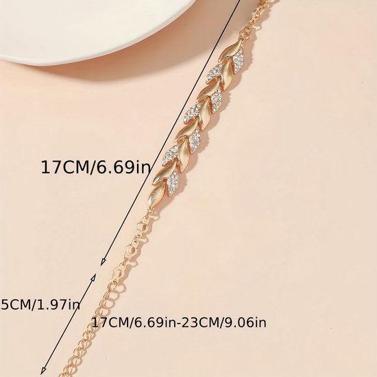 Sjika - Dames Armband Goudkleurig met Kristallen – Luxe Schakelarmband – Elegante Armband Dames – Trendy Sieraden - Cadeau van haar