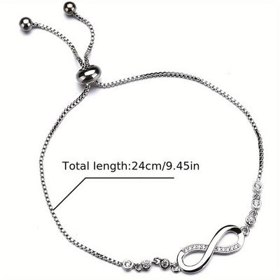 Sjika - Verstelbare Dames Armband – Infinity Teken – Stainless Steel – Zilver – Met Kristallen – Tijdloos Sieraad - Cadeau voor haar