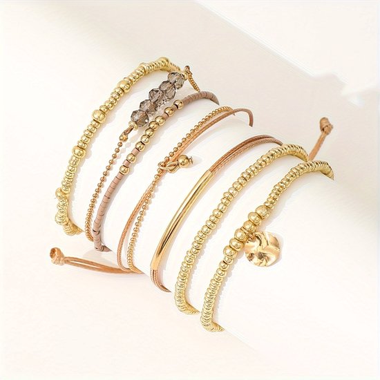 Sjika - Gold plated armbanden set – 7-delige damesarmbanden met kralen, bedels & hartdetail – Boho chic & elegant design – Perfect cadeau voor haar