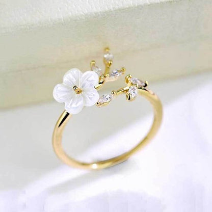 Sjika - Gouden Bloemen Ring Dames – Verstelbare Ring met Bloem & Zirkonia – Elegante Open Ring – Gold Plated - Cadeau voor haar