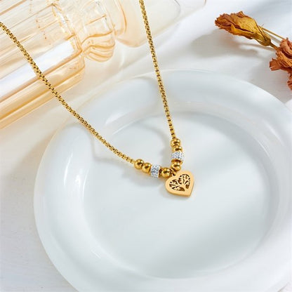 Sjika - Goudkleurige Ketting met Levensboom Hart Hanger – Luxe Dames Ketting – Symbolisch Sieraad – Perfect Cadeau voor haar