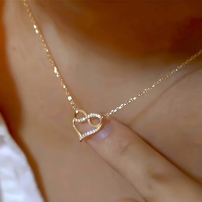 Sjika - Goudkleurige Hartjesketting met Infinity Symbool – Elegant en Tijdloos Design – Perfect Cadeau voor Haar