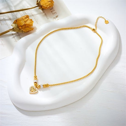 Sjika - Goudkleurige Ketting met Levensboom Hart Hanger – Luxe Dames Ketting – Symbolisch Sieraad – Perfect Cadeau voor haar