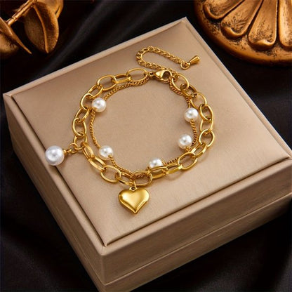 Sjika - Gold plated armband met parels & hartbedel – Luxe damesarmband – Trendy schakel design – Perfect cadeau voor haar