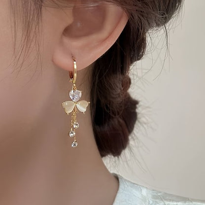 Sjika - Vlinder Oorbellen Dames Goudkleurig – Hartvormige Kristal Oorringen – Elegante Hangoorbellen met Strass – Trendy Sieraden voor Dames - Cadeau voor haar