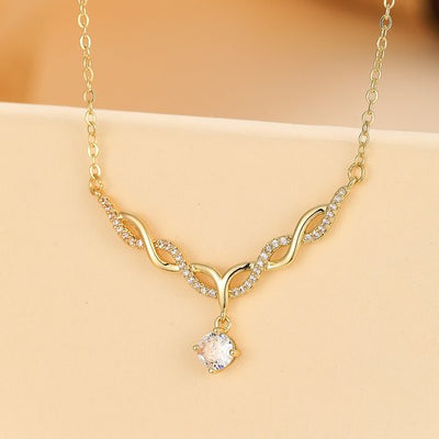 Sjika - Elegante 18k Goud Plated Ketting met Golvend Ontwerp en Zirkonia – Sprankelende Damesketting - Cadeau voor haar