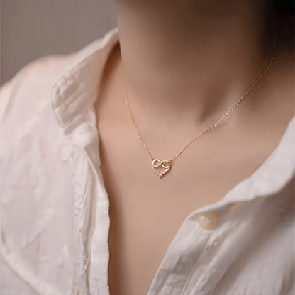 Sjika - Goudkleurige Hartjesketting met Infinity Symbool – Elegant en Tijdloos Design – Perfect Cadeau voor Haar