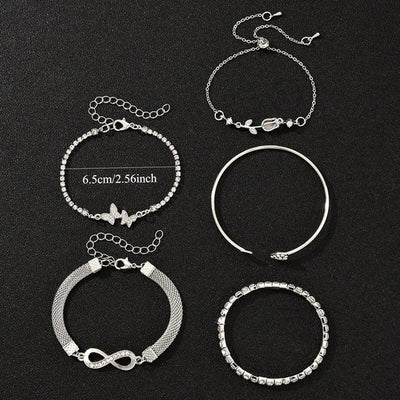 Sjika - 4 Delige Dames Armband Set Zilverkleurig – Infinity, Hart & Vlinder Armbanden – Strass Tennis Armband – Trendy Sieraden Set voor Dames - Cadeau voor haar