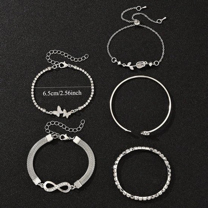 Sjika - 4 Delige Dames Armband Set Zilverkleurig – Infinity, Hart & Vlinder Armbanden – Strass Tennis Armband – Trendy Sieraden Set voor Dames - Cadeau voor haar