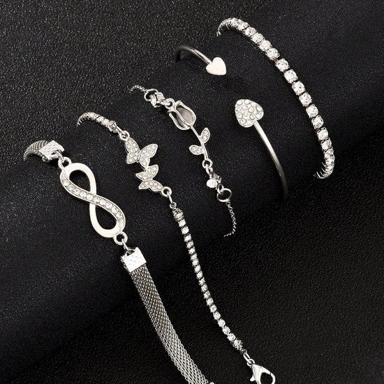 Sjika - 4 Delige Dames Armband Set Zilverkleurig – Infinity, Hart & Vlinder Armbanden – Strass Tennis Armband – Trendy Sieraden Set voor Dames - Cadeau voor haar