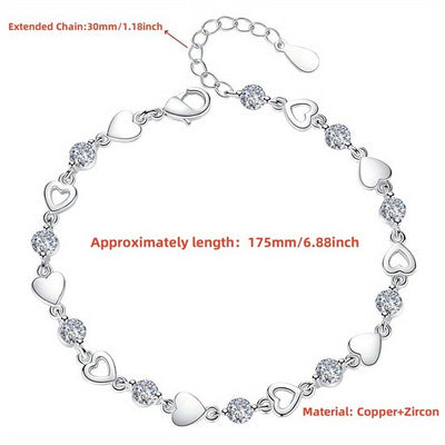 Sjika - Hartjes Armband Dames Zilverkleurig – Elegante Armband met Kristal Hartjes – Verstelbare Luxe Dames Sieraden – Trendy Armband - Cadeau voor haar