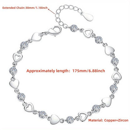 Sjika - Hartjes Armband Dames Zilverkleurig – Elegante Armband met Kristal Hartjes – Verstelbare Luxe Dames Sieraden – Trendy Armband - Cadeau voor haar