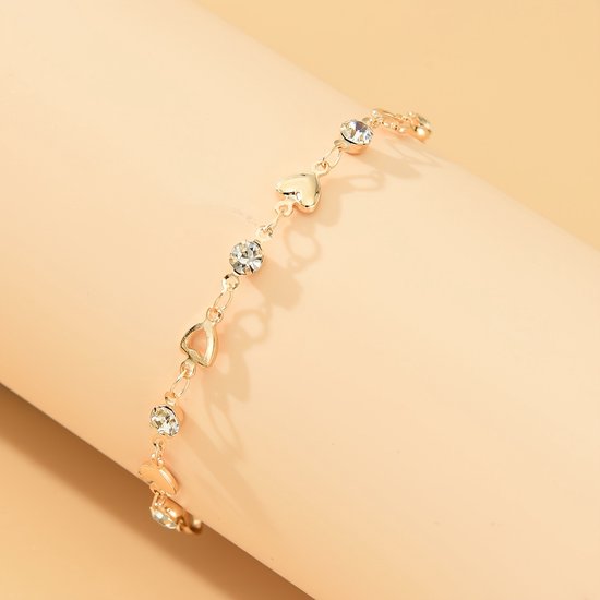 Sjika - Trendy armband met hartjes – Zirkonia stenen – Luxe dames sieraad – Perfect cadeau