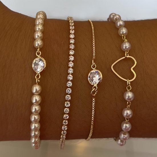 Sjika - Gouden Armbandenset Dames – 4 Delige Set met Parels, Hartje & Zirkonia – Luxe Layered Armbanden – Verstelbaar - Cadeau voor haar