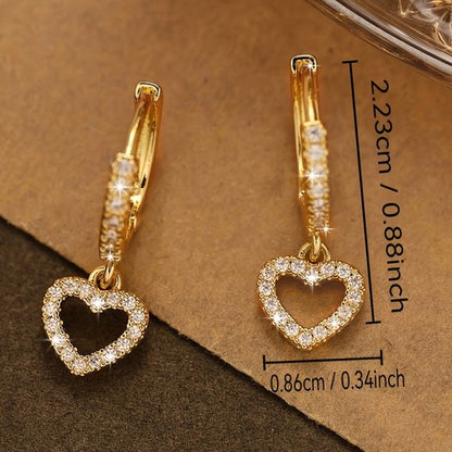 Sjika - Trendy hart oorbellen – Goudkleurige oorringen met steentjes – Perfect cadeau - Zirkonia - Voor haar
