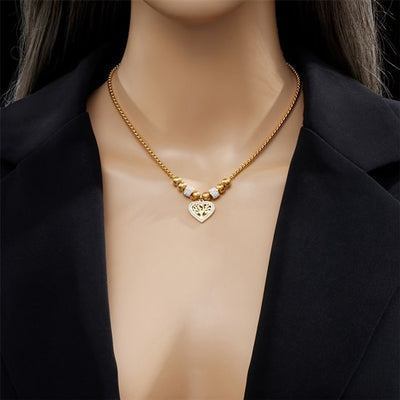 Sjika - Goudkleurige Ketting met Levensboom Hart Hanger – Luxe Dames Ketting – Symbolisch Sieraad – Perfect Cadeau voor haar