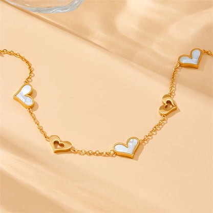 Sjika - Dames Armband Goudkleur – Elegante Hartjes Armband met Parelmoer – Verstelbaar Cadeau Sieraad
