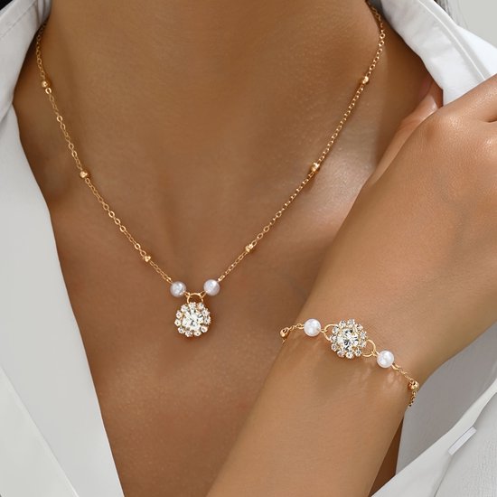 Sjika - Gouden Sieradenset Dames – Ketting & Armband met Parels en Zirkonia – Luxe Elegante Set – Gold Plated - Cadeau voor haar