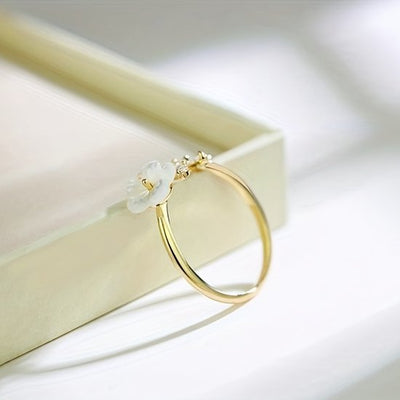 Sjika - Gouden Bloemen Ring Dames – Verstelbare Ring met Bloem & Zirkonia – Elegante Open Ring – Gold Plated - Cadeau voor haar