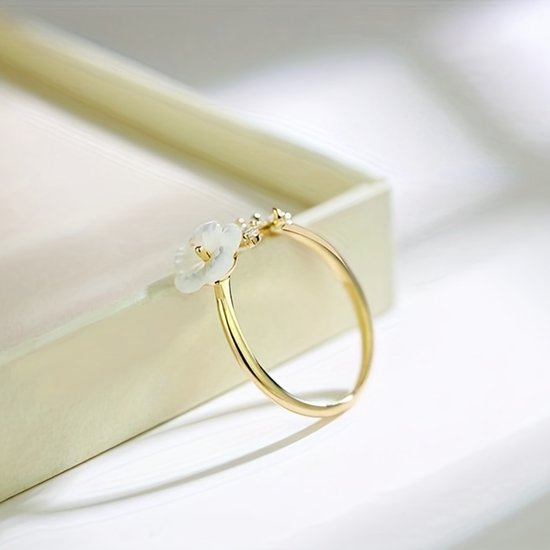 Sjika - Gouden Bloemen Ring Dames – Verstelbare Ring met Bloem & Zirkonia – Elegante Open Ring – Gold Plated - Cadeau voor haar