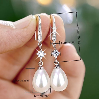 Sjika - Elegante Oorbellen met Parel en Kristal – Zilverkleurige Dames Oorbellen – Tijdloos & Luxe Design