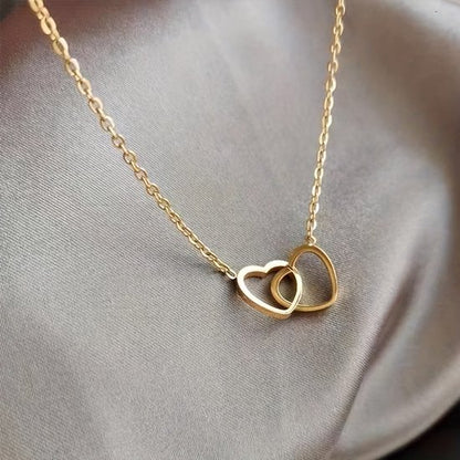 Sjika - Gouden Hartjes Ketting Dames – Dubbel Hart Hanger – Minimalistische Ketting – Gold Plated – Cadeau voor Haar