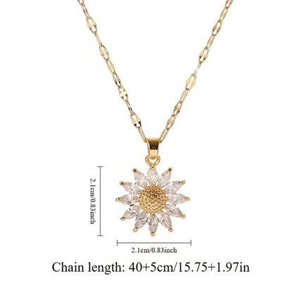 Sjika - Bloem Ketting Dames Goudkleurig – Elegante Zonnebloem Hanger met Kristal Steentjes – Luxe Dames Ketting – Trendy Sieraden - Cadeau voor haar