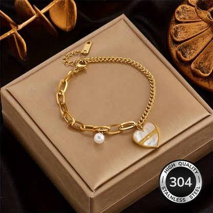 Sjika - Gouden Armband met Hart Hanger & Parel – Liefdes Armband – Verstelbaar – Luxe Dames Sieraad