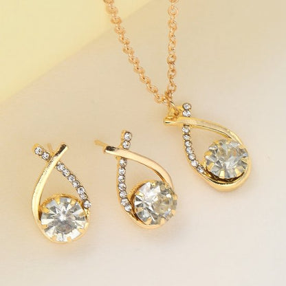 Sjika - Goudkleurige Sieraden Set Dames – Ketting & Oorbellen met Kristal Steen – Elegante Strass Sieraden Set – Luxe Cadeauset voor Haar