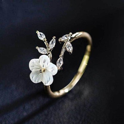 Sjika - Gouden Bloemen Ring Dames – Verstelbare Ring met Bloem & Zirkonia – Elegante Open Ring – Gold Plated - Cadeau voor haar