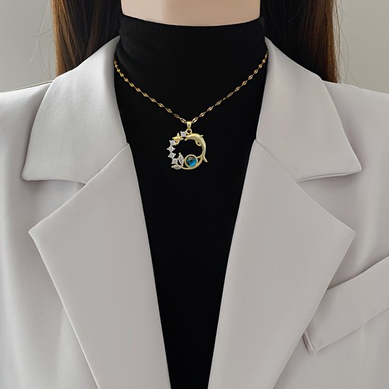 Sjika - Gold Plated Dolfijn Ketting – Goudkleurig – Zirkonia & Blauw Kristal – Dames - Cadeau
