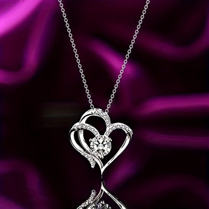 Sjika - Zilverkleurige Dubbel Hart Ketting met Kristal – Luxe Hartjes Hanger – Romantische Dames Ketting – Perfect Cadeau