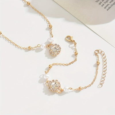 Sjika - Gouden Sieradenset Dames – Ketting & Armband met Parels en Zirkonia – Luxe Elegante Set – Gold Plated - Cadeau voor haar