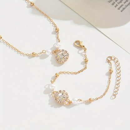 Sjika - Gouden Sieradenset Dames – Ketting & Armband met Parels en Zirkonia – Luxe Elegante Set – Gold Plated - Cadeau voor haar