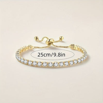 Sjika - Gold plated tennisarmband met zirkonia – Luxe verstelbare damesarmband – Elegant & fonkelend design – Perfect cadeau voor haar