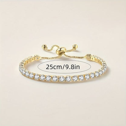 Sjika - Gold plated tennisarmband met zirkonia – Luxe verstelbare damesarmband – Elegant & fonkelend design – Perfect cadeau voor haar