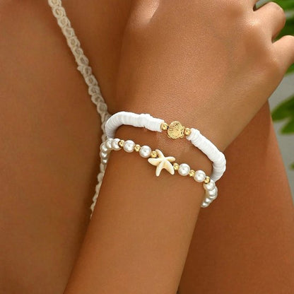 Sjika - Bohemian Schelpen Sieraden Set Dames – Strand Ketting & Armband Set – Zeester, Parels en Schelpjes – Zomer Sieraden Wit/Goud - Cadeau voor haar