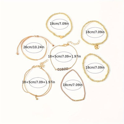Sjika - Gold plated armbanden set – 7-delige damesarmbanden met kralen, bedels & hartdetail – Boho chic & elegant design – Perfect cadeau voor haar