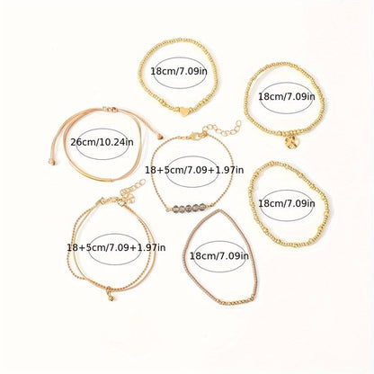Sjika - Gold plated armbanden set – 7-delige damesarmbanden met kralen, bedels & hartdetail – Boho chic & elegant design – Perfect cadeau voor haar