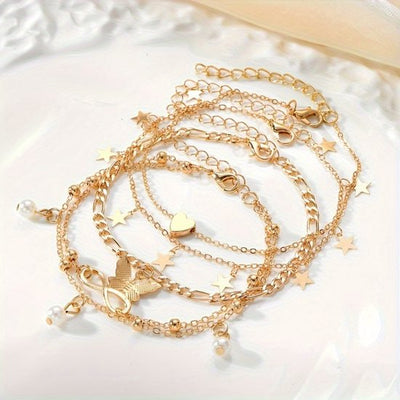 Sjika - Gouden Enkelbandjes Set Dames – 18K Gold Plated – Trendy Boho Style – Met Bedels & Parel Hangers – 5-delige Sieradenset