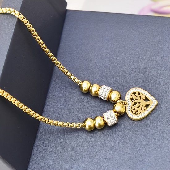 Sjika - Goudkleurige Ketting met Levensboom Hart Hanger – Luxe Dames Ketting – Symbolisch Sieraad – Perfect Cadeau voor haar