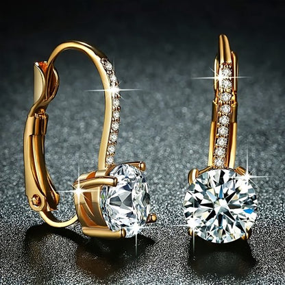 Sjika - Goudkleurige Oorhangers met Kristal – Luxe Dames Oorbellen – Elegant & Tijdloos Design - Cadeau voor haar