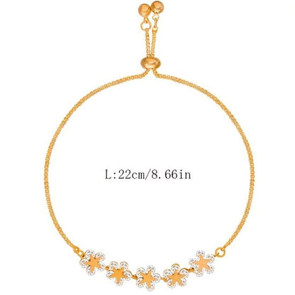 Sjika - Luxe Gouden Armband met Bloemen & Zirkonia – Verstelbaar – Perfect Cadeau voor Haar