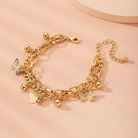 Sjika - Gouden Vlinder Armband Dames – Schakelarmband met Bedels – Verstelbare Armband – Trendy Sieraad – Gold Plated