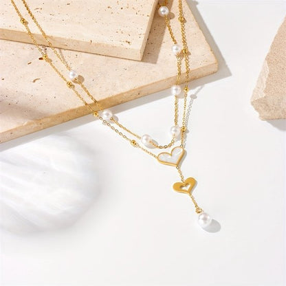 Sjika - Gold plated ketting met dubbele hart hanger & parels – Luxe damesketting – Elegant & romantisch design – Perfect cadeau voor haar